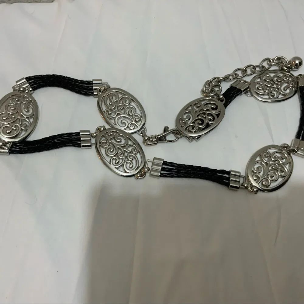 Silver tone oval links and 3 lines braided black leather belt